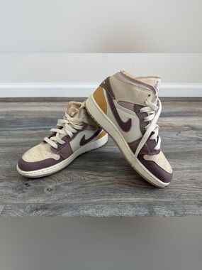 The Air Jordan 1 Mid SE Craft 'Inside Out - Taupe Haze' kids' sneakers boys 5.5Y